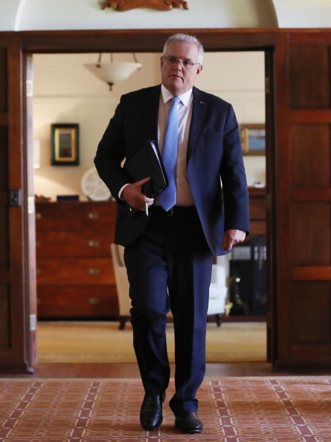 Prime Minister Scott Morrison walks the halls of The Lodge. Picture: Adam Taylor/PMO