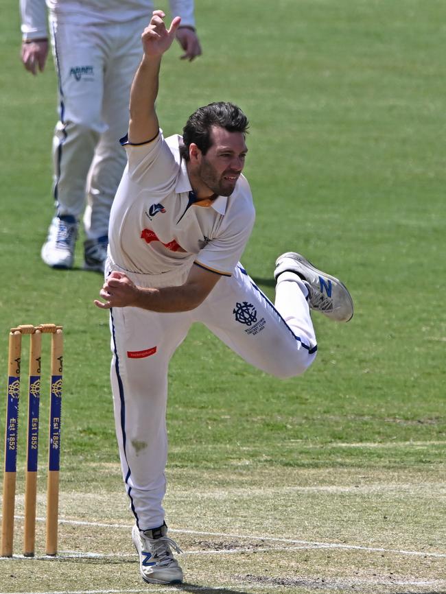 VSDCA: SA Sturrock rolls the arm over for Williamstown. Picture: Andy Brownbill