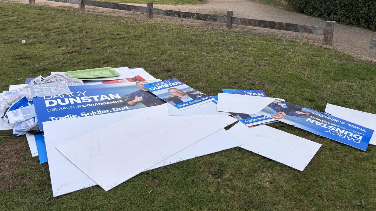 Signs promoting Liberal candidate for Corangamite Darcy Dunstan were strewn on the grass out the front of the Barwon Heads Bowls Club. Picture: Supplied.