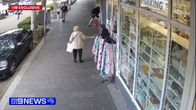 CCTV allegedly shows a man pouring petrol into the store in The Entrance and on the pavement outside, before setting it alight with the family inside. Picture: Supplied / 9News
