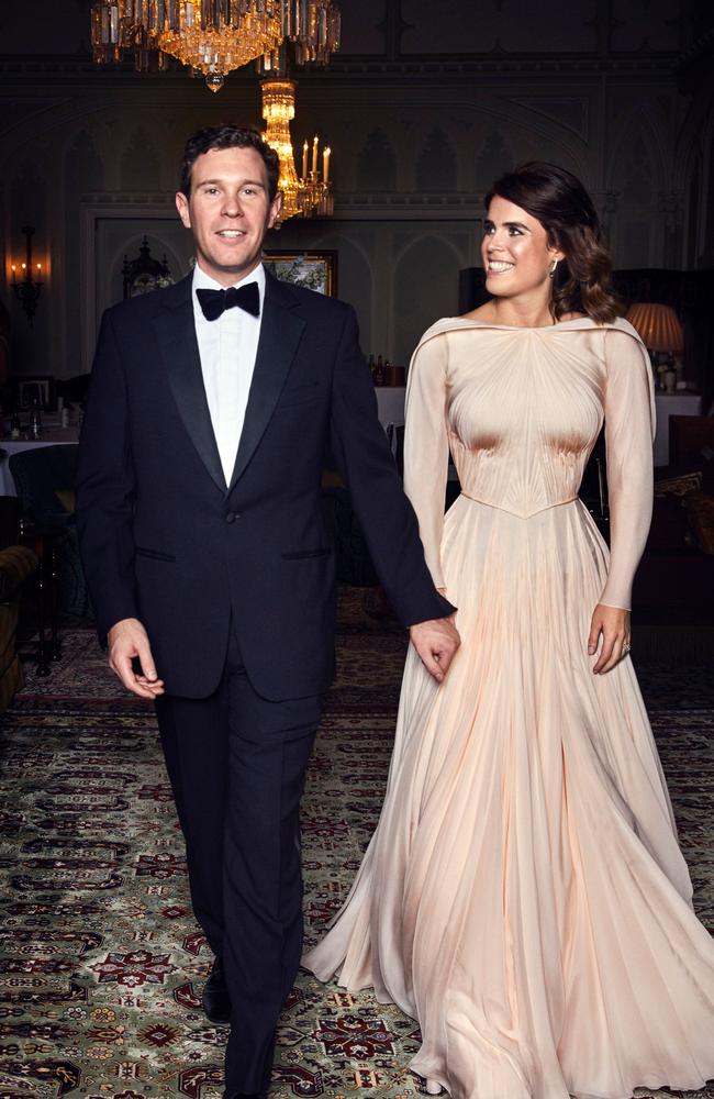 Jack Brooksbank and Princess Eugenie, pictured at their royal wedding reception in 2018, are close with Prince Harry and Meghan Markle. Picture: AFP