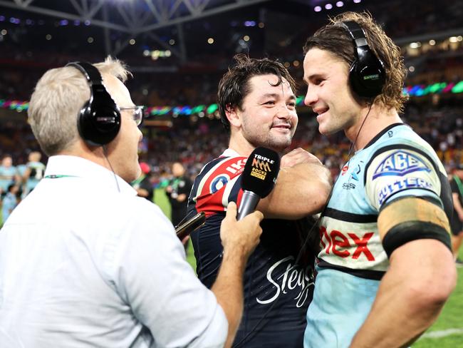 Old mates Brandon Smith and Nicho Hynes share a moment. Picture: Hannah Peters/Getty Images