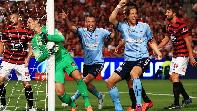Marc Janko of Sydney FC scores a goal during the Western Sydney Wanderers v Sydney FC A League game at Pirtek Stadium, Parramatta. pic Mark Evans