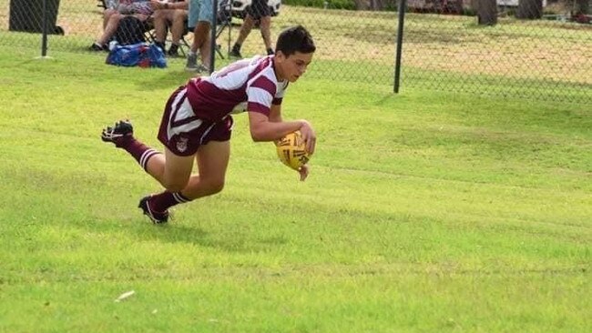 Harrison Vidley scoring a try.