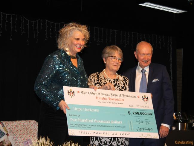 Former Hope Horizons general manager Jo Capp, Prior Sue Fox and past Prior Dr. Jeff Prebble at the Living Well with Hope dinner in July, 2024. Photo: Matt Ryan Photography