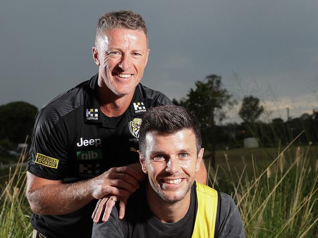 Richmond coach Damien Hardwick with his captain Trent Cotchin and their cup.AFL - Sunday, 25th October, 2020 - Richmond players the afternoon after the historic Grand Final Win - at their Hub location in the Gold Coast. Picture: Sarah Reed