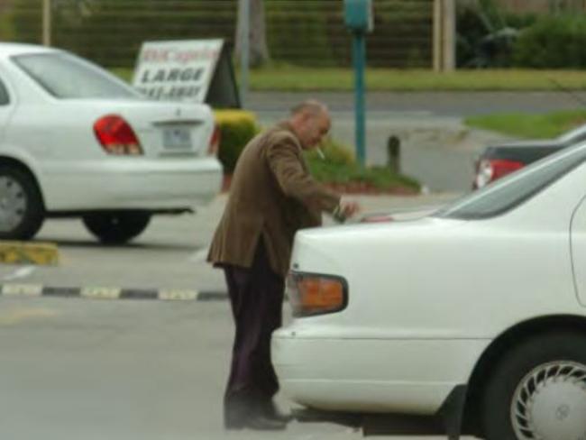 Madafferi drops a bag into the boot of his car. Picture: Australian Federal Police.