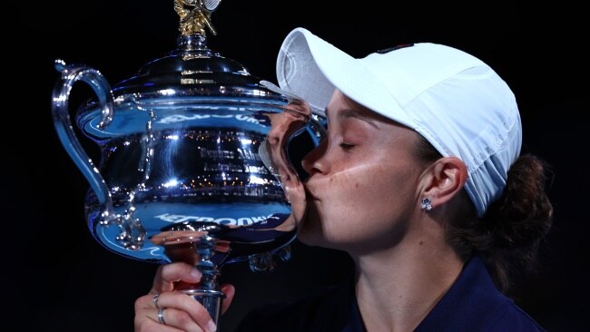 Barty taking it all in with a new piece of silverware to add to her trophy cabinet. Picture: Clive Brunskill/Getty Images