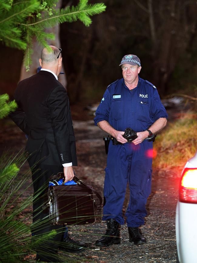 A detective arrives at the Cowan scene where Easter was shot. Picture: Troy Snook