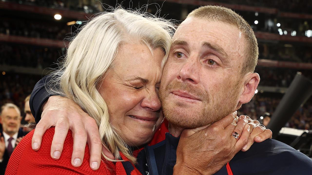 Kate Roffey and Simon Goodwin celebrate the Demons’ premiership success.