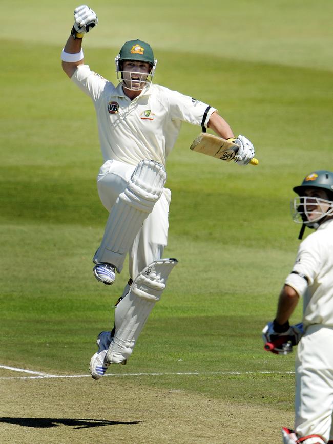 Phillip Hughes celebrates his century for Australia against South Africa at Durban in 2009.