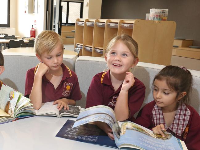 CANTERBURY BANKSTOWN EXPRESS/AAP. Students (L-R) Mariah Mel (6), Melik Neaal (7), James Jurnic(7), Leila Fullerton(6) and Lana Adam(6) pose for photos at Prestons, Tuesday, 4th February 2020. An $11m upgrade of Prestons Public School is now complete, which now has 10 new classrooms and an expanded administration office. (AAP IMAGE / Robert Pozo)