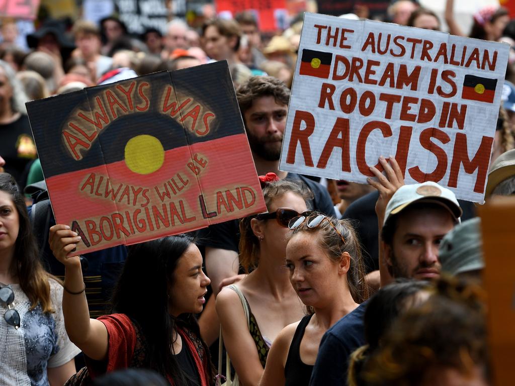 Protesters are seen during the Invasion Day rally in Melbourne on January 26, 2020. Picture: James Ross/AAP