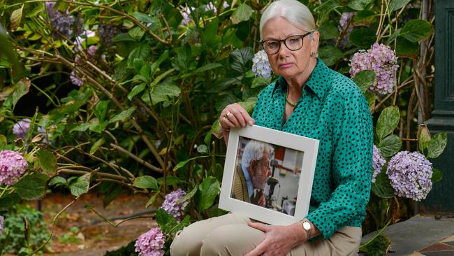 Mary Lou Simpson with a picture of her father Archie McArthur, who died a painful death two months after being diagnosed with a brain tumour. Picture: Brenton Edwards