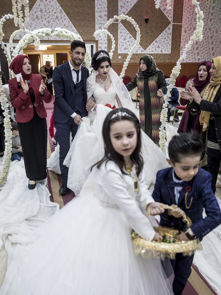 Groom Mohammed Tahir and bride Ilham Bashar in Mosul. Picture: Ella Pellegrini