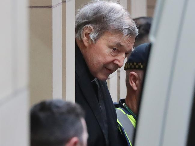 George Pell is led away in a prison van after losing his appeal. Picture: Alex Coppel