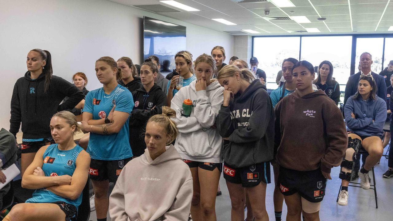 Port Adelaide players watch Tuesday’s press conference. Picture: Kelly barnes