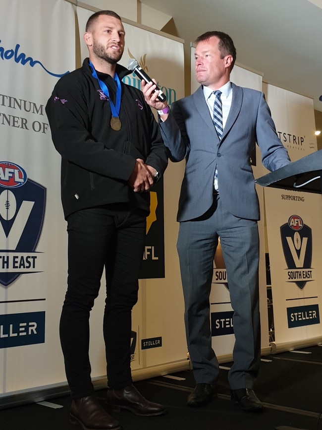 Mitch Hallahan accepts his medal. Picture: Scott Grimster.