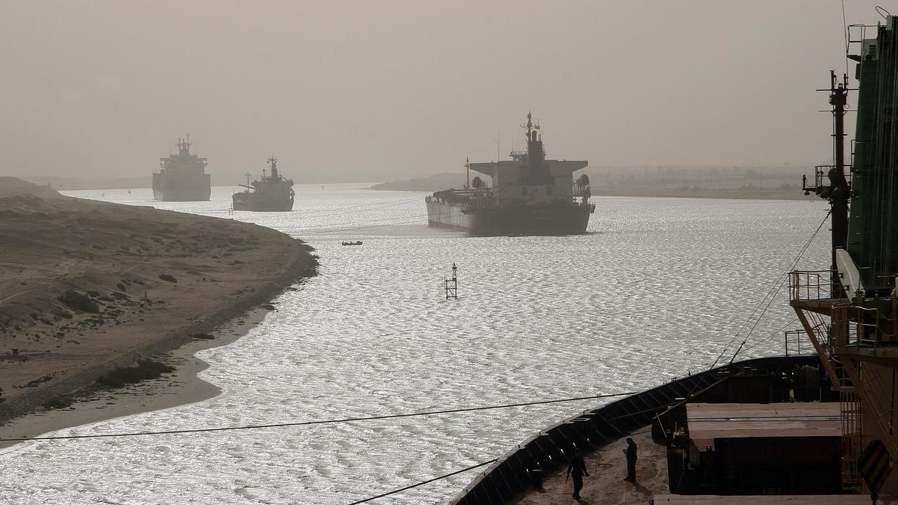 This image shows another container ship that ran aground in the Suez Canal back in April 2006, sparking similar chaos. Picture: AFP