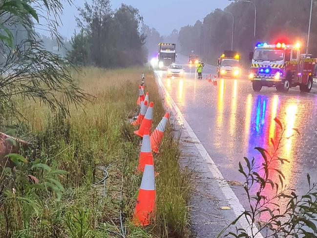 SES crews worked to free a driver following a crash in heavy rain on the Pacific Highway near Bonville on Sunday, March 14.