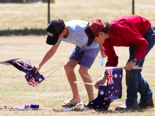 The kids had fun collecting and handing out flags.