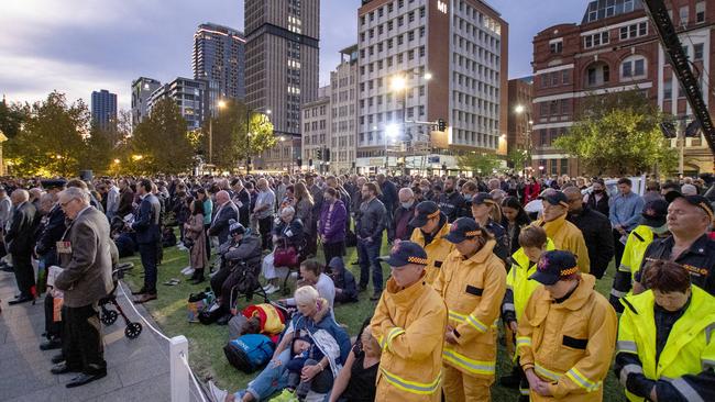 Thousands of people stand silent at the city Dawn Service, at the National War Memorial on North Terrace. Picture: NCA NewsWire / Naomi Jellicoe