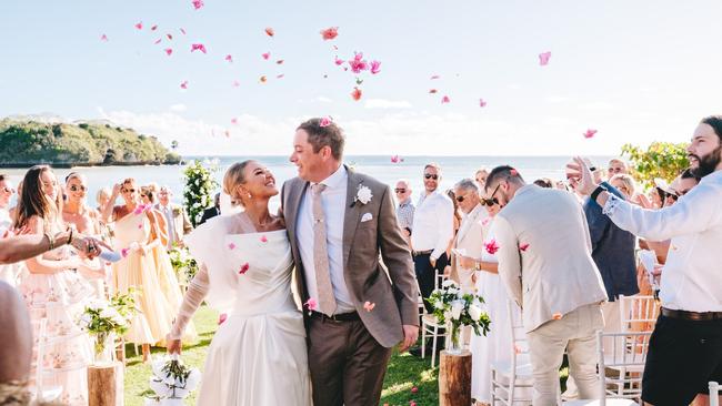 Stephanie Barrington and Hamish Macdonald were married by a Fijian celebrant and were escorted to and from the ceremony by Fijian Warriors. Picture: Nadi Bay Photography Fiji