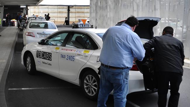 Taxis line up in the rank at the Adelaide Airport. Picture: MICHAEL MARSCHALL