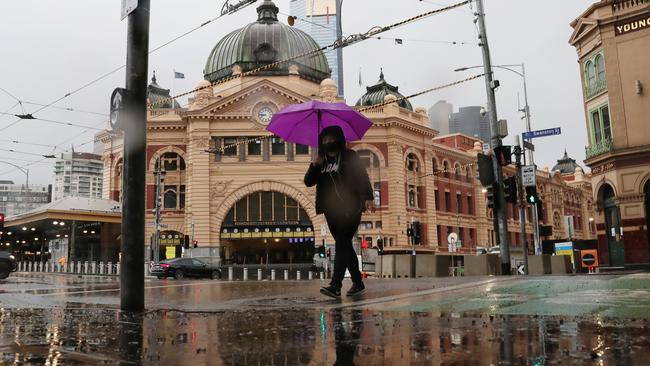 Melburnians will not be allowed to travel to the NT and will have to endure the city’s infamous weather for longer. Picture: David Crosling