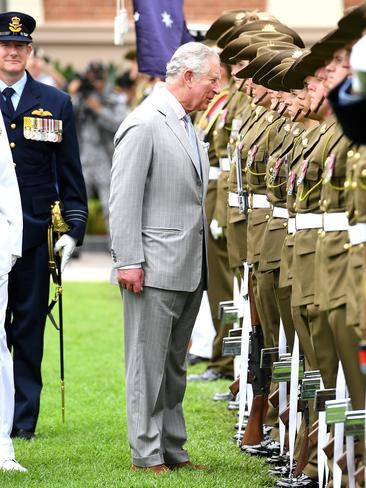 Prince Charles (centre) inspects the royal guard during a visit in Brisbane. Picture: Dan Peled/AAP