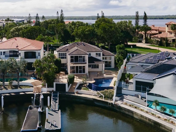 Billionaire Clive Palmer has listed two luxurious homes for sale. Pictured is:  30 King Arthurs Court, Sovereign Islands, Qld. Picture: RealEstate.com.au