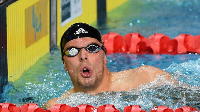 Kyle Chalmers looks on after winning the Men's 200m Freestyle final on day 1 of the 2018 Australian Swimming Trials at the Gold Coast Aquatic Centre at Southport on the Gold Coast, Wednesday, February 28, 2018. (AAP Image/Dave Hunt) NO ARCHIVING, EDITORIAL USE ONLY