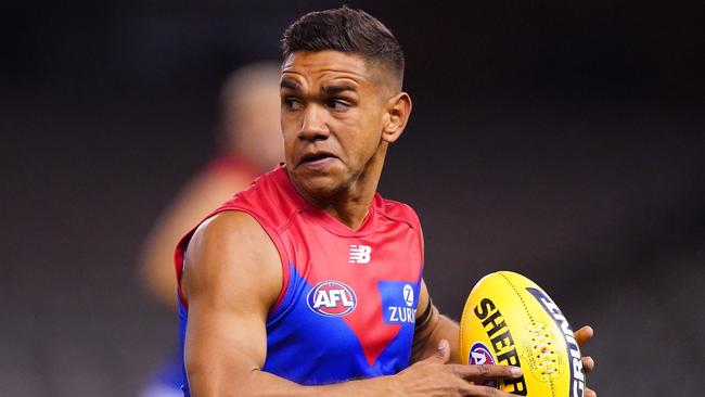 Neville Jetta of the Demons runs with the ball during the Round 2 AFL match between the Carlton Blues and the Melbourne Demons at Marvel Stadium in Melbourne, Saturday, June 13, 2020. (AAP Image/Scott Barbour) NO ARCHIVING, EDITORIAL USE ONLY