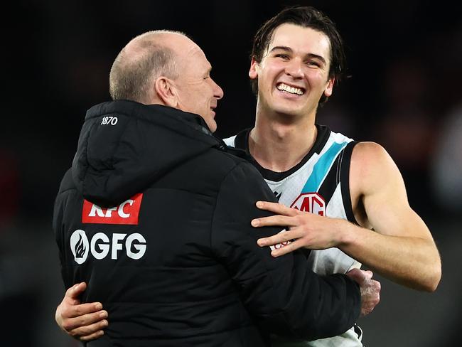 MELBOURNE, AUSTRALIA - JUNE 30: Ken Hinkley, Senior Coach of the Power and Connor Rozee of the Power celebrate winning the round 16 AFL match between St Kilda Saints and Port Adelaide Power at Marvel Stadium, on June 30, 2024, in Melbourne, Australia. (Photo by Quinn Rooney/Getty Images)