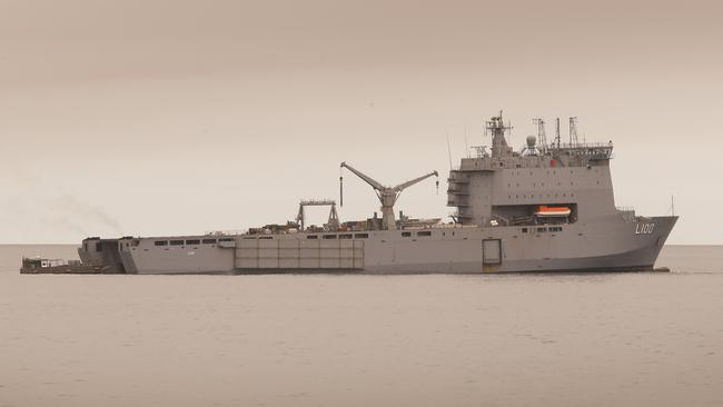 HMAS Choules anchored offshore near Mallacoota gets ready to receive evacuees. Picture: David Caird