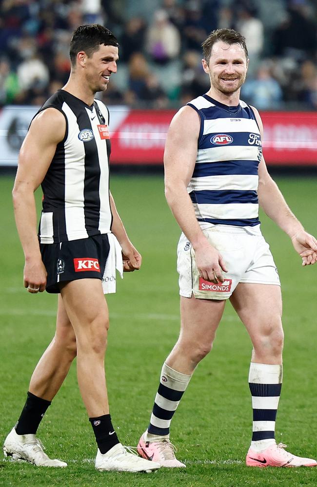 Scott Pendlebury of the Magpies and Patrick Dangerfield of the Cats chat after the game on Friday night. Picture: Michael Willson/AFL Photos via Getty Images.