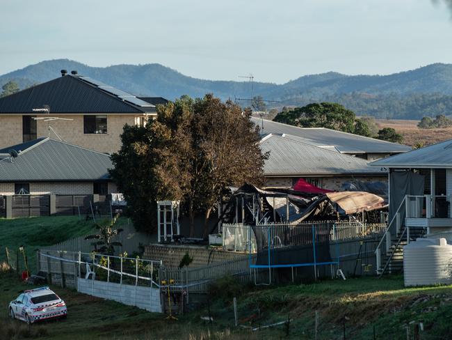 13-06-2021 Fire scene investigators at the remains of a fatal fire in Golf Links Drive, Kilcoy. PICTURE: Brad Fleet