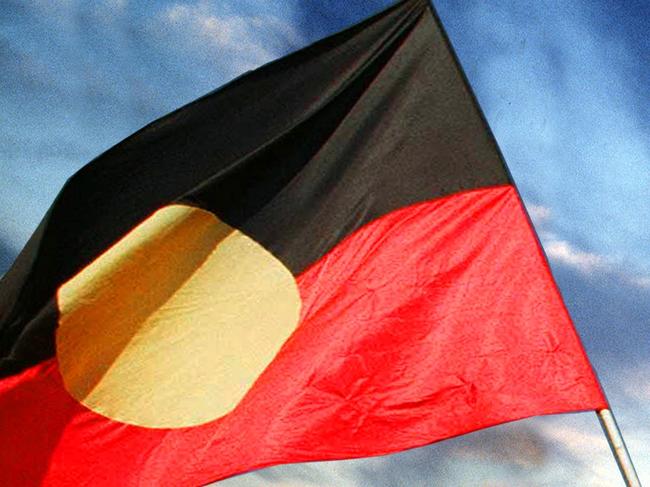 EMBARGO FOR TWAM 31 OCT 2020 FEE APPLIESAn Aboriginal flag, 3 December 1997.GREG NEWINGTON / Channel Nine Publications
