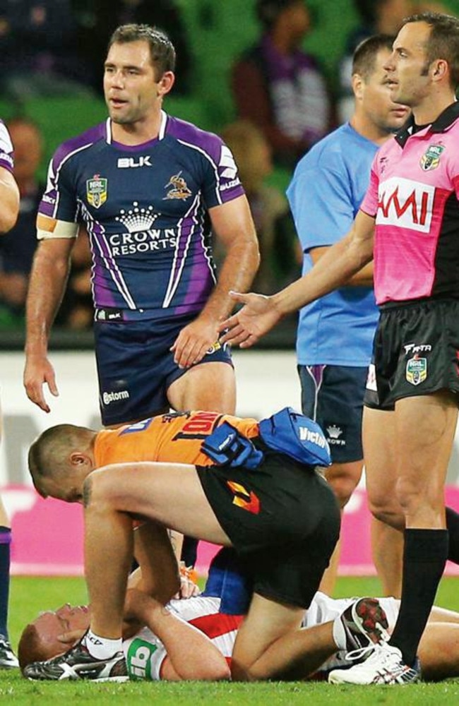 McKinnon laying on the ground after the tackle that left him as a quadriplegic. Picture: Getty Images