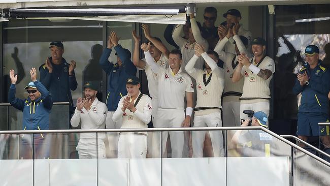 Australian players celebrate as Steve Smith reached his century at Edgbaston.