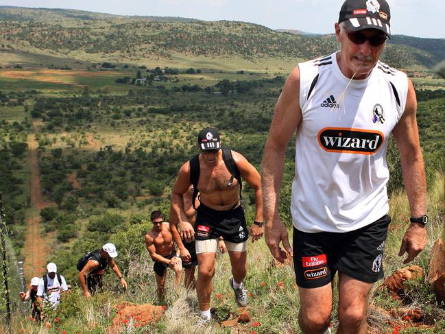 Mick Malthouse leads Anthony Rocca and the rest of the team up a steep incline at the Elgro River Game Park in South Africa.