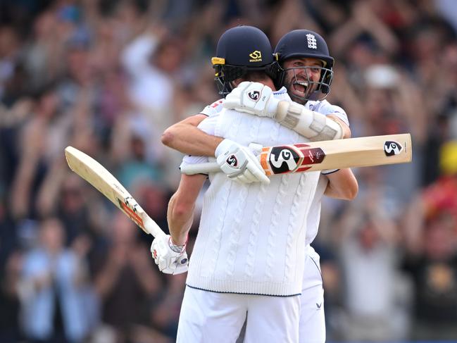 LEEDS, ENGLAND - JULY 09: Chris Woakes of England celebrates with teammate Mark Wood after hitting the winning runs to win the LV= Insurance Ashes 3rd Test Match between England and Australia at Headingley on July 09, 2023 in Leeds, England. (Photo by Stu Forster/Getty Images)