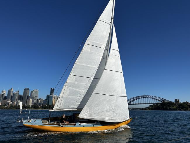 With a distinct yellow hull, the restored yacht Ratu has been a sight across Sydney Harbour in recent weeks.