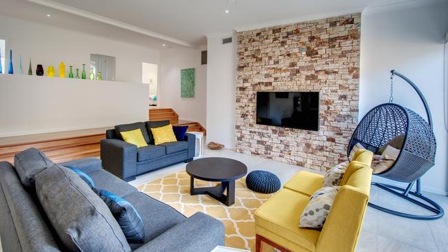 Stone walls are a feature of the lounge.