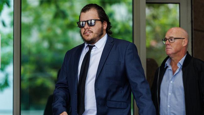 An accused A-league pitch invader who pleaded guilty leaves the Melbourne Magistrates Court. Picture NCA NewsWire / Aaron Francis