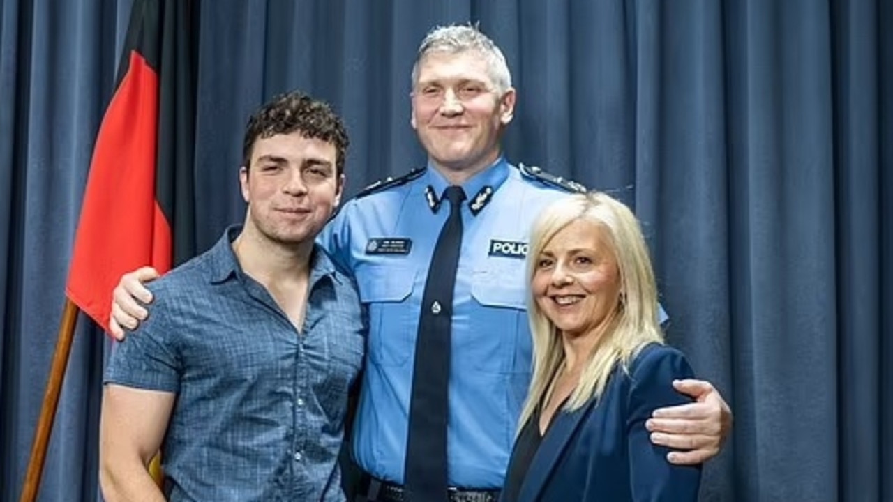 Michael Blanch, left with his father WA Police Commissioner Col Blanch (centre). picture WA police / Facebook