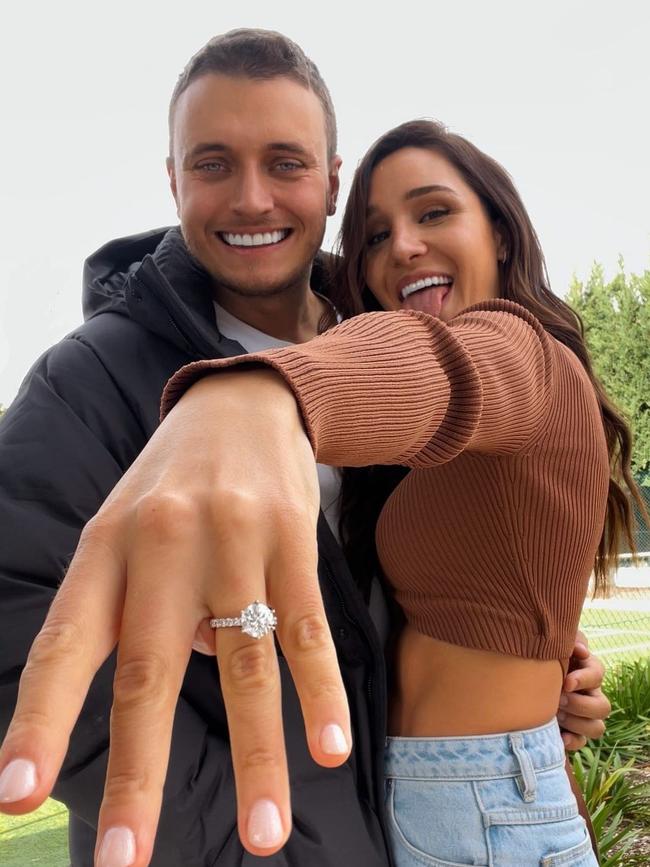 Multi-millionaire fitness mogul Kayla Itsines has announced her engagement to “best friend” Jae Woodroffe. Picture: @jaewoodroffe/Instagram