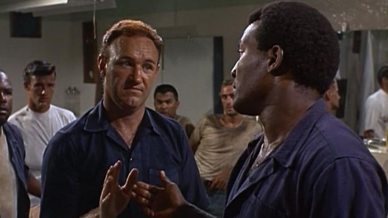 #64: Red Fraker in Riot (1969) - Hackman's Fraker leads 35 of a prison's most violent offenders on a prison riot while the warden is away to take over their portion of the prison.