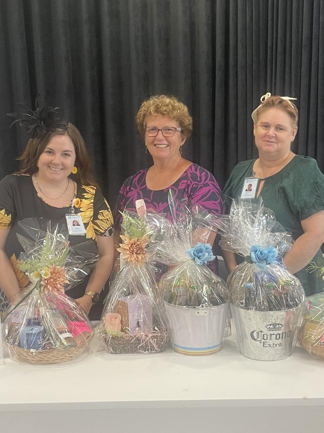 Tanya Bentley, Bev Biddulph and Sharon Lovekin of Fraser Coast Hospice who hosted a raffle for Beach House function-goers.