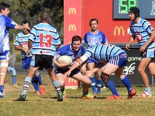 BOYS IN BLUE:   Cities fullback Jeremy Green finds the advantage line during the match against Miles/Taroom/Wandoan reserve- grade side on Sunday. Picture: Jorja McDonnell